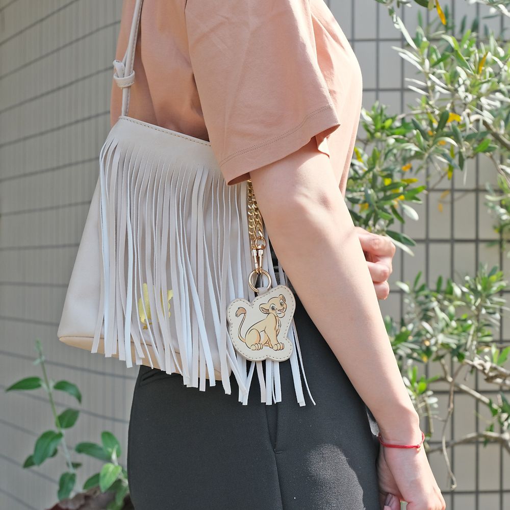 Plus Anq(プラスアンク)  『ライオン・キング』 ナラ デザイン フリンジショルダーバッグ&チャーム